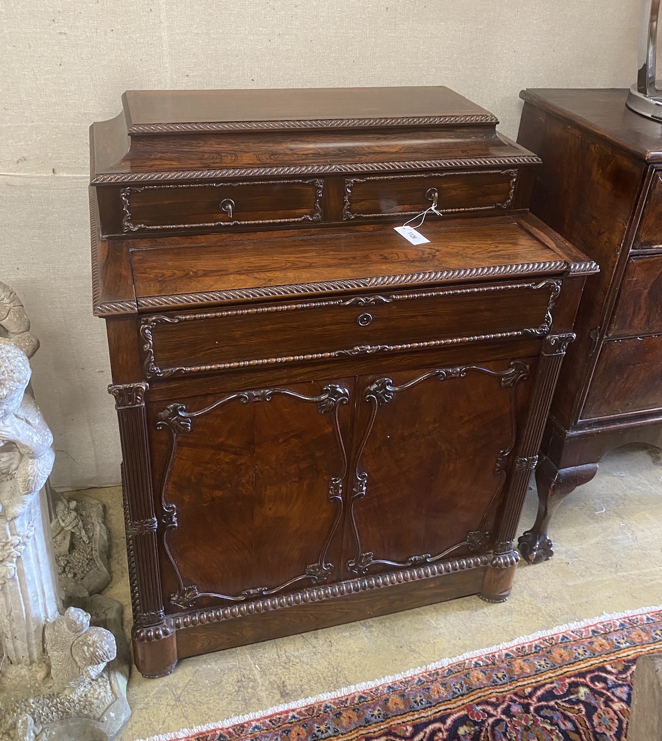 A 19th century French rosewood secretaire cabinet, width 86cm, depth 53cm, height 107cm